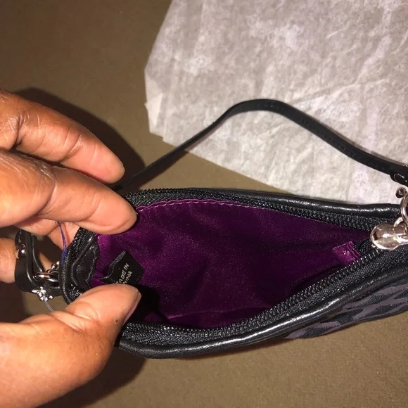 COACH Madison Graphic OP Art Small Silver and Purple Wristlet

Wristlet - Picture 6 of 6